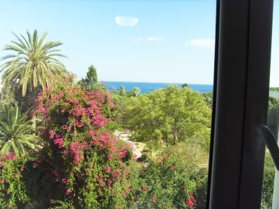Photo 12 de Coquette appartement à Hammamet : vue Mer/Jardin