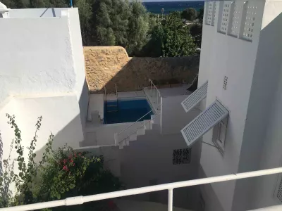 Photo 26 de Villa & piscine avec vue mer au coeur de la Medina