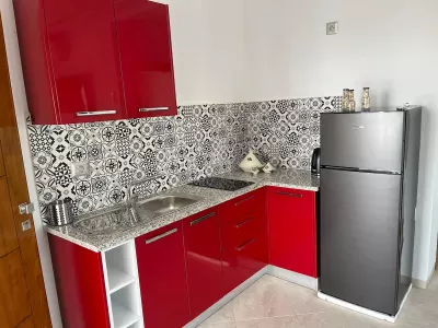 Studio Rouge Cosy à Dar Lili Djerba