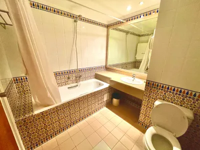 Photo 9 de Residence Royal deluxe (chambre  et salon )