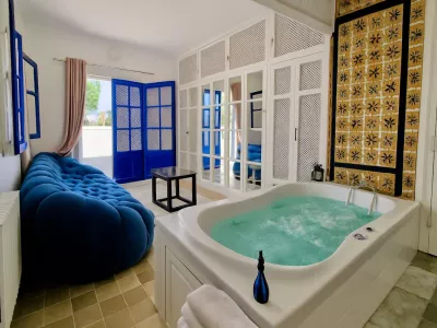 Photo 13 de Dar Mima : Rooftop, Vue Mer & Jacuzzi Privé